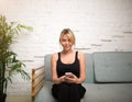 Smiling female manager chatting on cellphone during work break in company Royalty Free Stock Photo