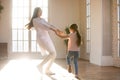 Smiling female pediatrician having fun with little patient Royalty Free Stock Photo