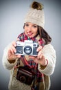 Smiling female photographer with a vintage camera Royalty Free Stock Photo