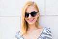 Smiling female teenager in sunglasses Royalty Free Stock Photo