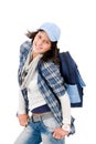 Smiling female teenager wear cool outfit schoolbag