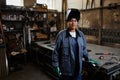 Smiling Female Welder At Factory Royalty Free Stock Photo