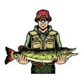 Smiling fisherman holding caught pike fish