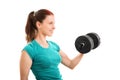 Smiling fit girl lifting a dumbbell Royalty Free Stock Photo