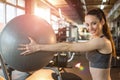 Smiling fit sportswoman exercising with pilates ball in gym Royalty Free Stock Photo