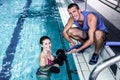 Smiling fit woman doing aqua aerobics Royalty Free Stock Photo