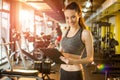 Smiling fitness instructor with clipboard at gym Royalty Free Stock Photo