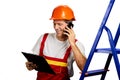 Smiling foreman talking on cell phone. Royalty Free Stock Photo