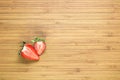 Smiling fried egg lying on a wooden cutting board with morning inscription near it. Classic Breakfast concept. Royalty Free Stock Photo