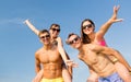 Smiling friends having fun on summer beach Royalty Free Stock Photo