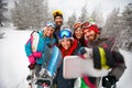 Smiling friends with ski on winter holidays - Skiers having fun Royalty Free Stock Photo