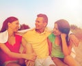 Smiling friends in sunglasses on summer beach Royalty Free Stock Photo