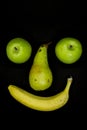 Smiling fruit face with apple eyes Royalty Free Stock Photo