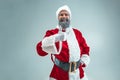 Funny guy in christmas hat. New Year Holiday. Christmas, x-mas, winter, gifts concept. Royalty Free Stock Photo