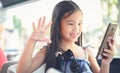 Smiling funny little girl with freckles doing selfie Royalty Free Stock Photo