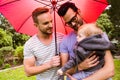 Smiling gay couple with child Royalty Free Stock Photo