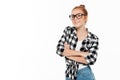 Smiling ginger woman in shirt posing with crossed arms