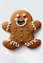 Smiling gingerbread man cookie isolated on a white background