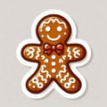 Smiling gingerbread man with icing details and a bow tie, embodying holiday cheer Royalty Free Stock Photo