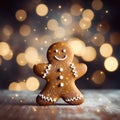 Smiling gingerbread man with bokeh lights in background. Christmas and New Year theme. Traditional Christmas cookies