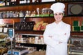 Smiling girl assistant displaying assortment