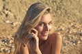 Smiling girl at the beach in a sunny day Royalty Free Stock Photo