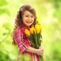 Smiling girl with big bouquet of flowers Royalty Free Stock Photo