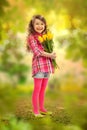 Smiling girl with big bouquet of flowers Royalty Free Stock Photo