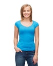 Smiling girl in blank blue t-shirt