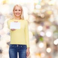 Smiling girl with blank business or name card Royalty Free Stock Photo