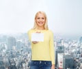 Smiling girl with blank business or name card Royalty Free Stock Photo