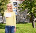 Smiling girl with blank business or name card Royalty Free Stock Photo