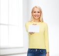 Smiling girl with blank business or name card Royalty Free Stock Photo