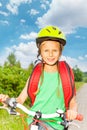 Smiling girl with braids in bicycle helmet Royalty Free Stock Photo