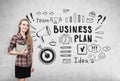 Smiling girl and business plan doodles Royalty Free Stock Photo