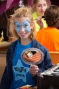 Smiling girl with butterfly makeup