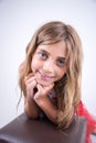 Smiling girl in a calm expression Royalty Free Stock Photo