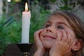 Smiling Girl and candle
