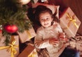 Smiling girl with christmas presents Royalty Free Stock Photo