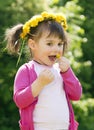 A smiling girl with the dandelion Royalty Free Stock Photo