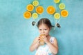 Smiling girl drinks fresh orange juice Royalty Free Stock Photo