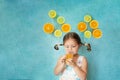 Smiling girl drinks fresh orange juice Royalty Free Stock Photo