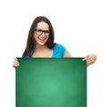 Smiling girl with eyeglasses and white blank board Royalty Free Stock Photo