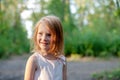 Smiling girl in the forest