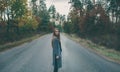 Smiling girl on a forest road. She is looking at the camera. Close-up Royalty Free Stock Photo