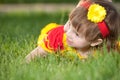 Smiling girl on the green lawn Royalty Free Stock Photo