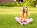 Smiling girl holding basket with berry Royalty Free Stock Photo