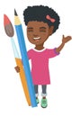 Smiling girl holding big pencil and paintbrush. Royalty Free Stock Photo