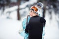 Smiling girl holding her snowboard Royalty Free Stock Photo