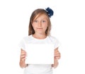 Smiling girl holding a white card, Royalty Free Stock Photo